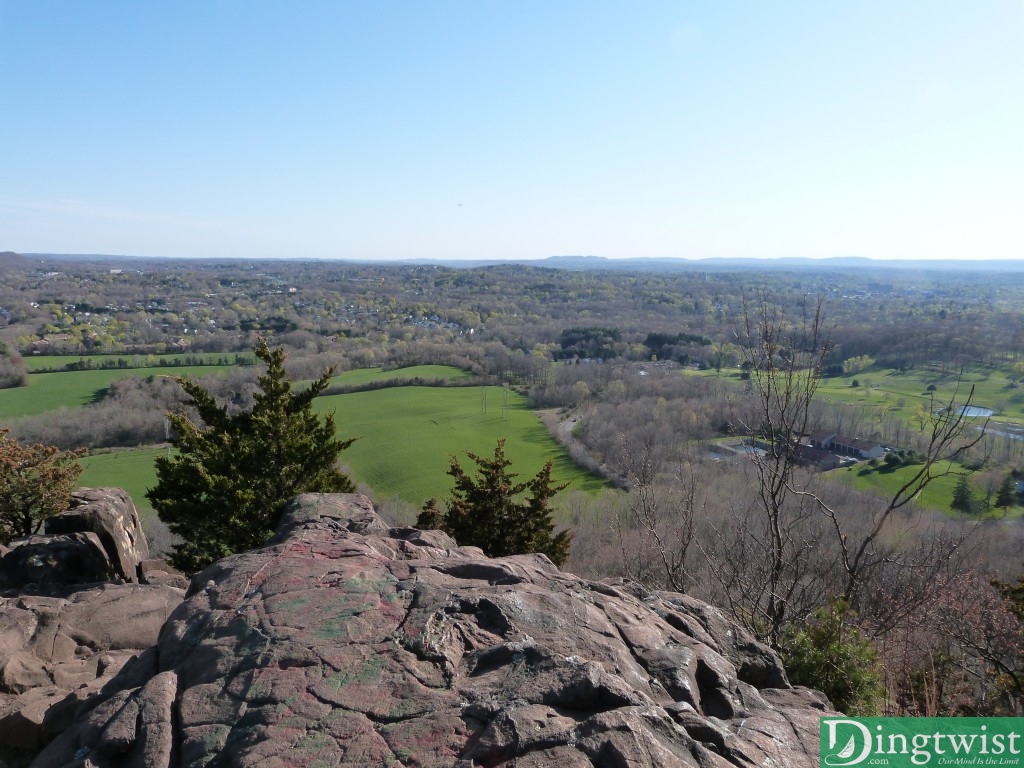 The view is worth it. The picture makes it seem lower than the peak really is. When you're done viewing, go back the way you came and continue along the ridge.